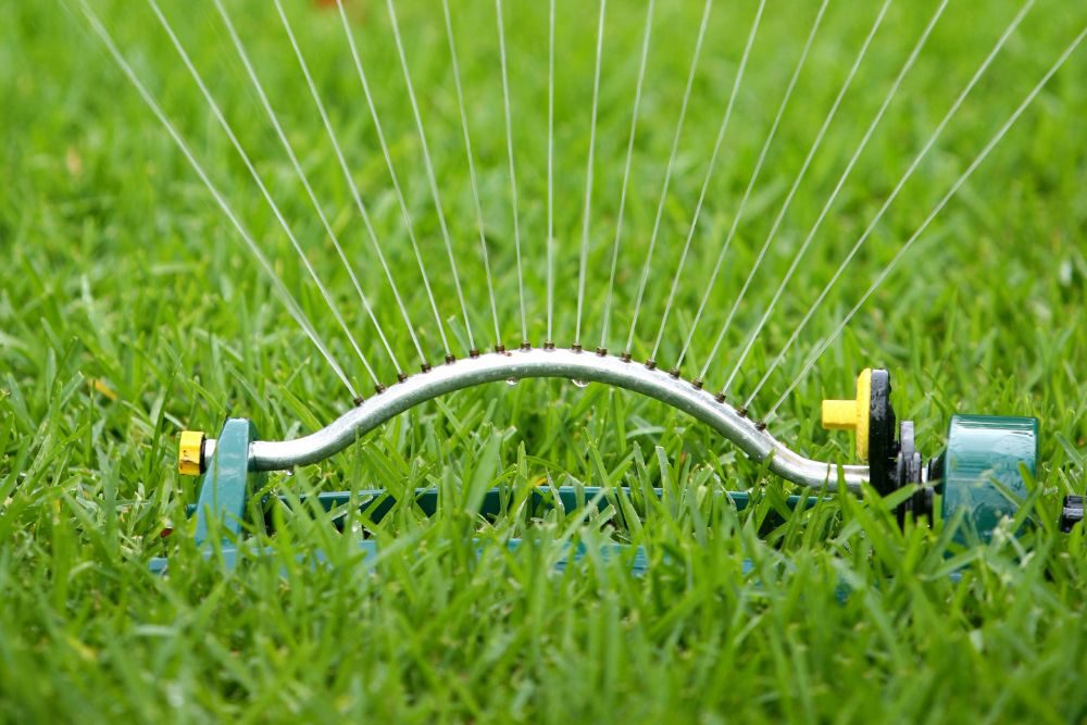 Gras sproeien na maaien